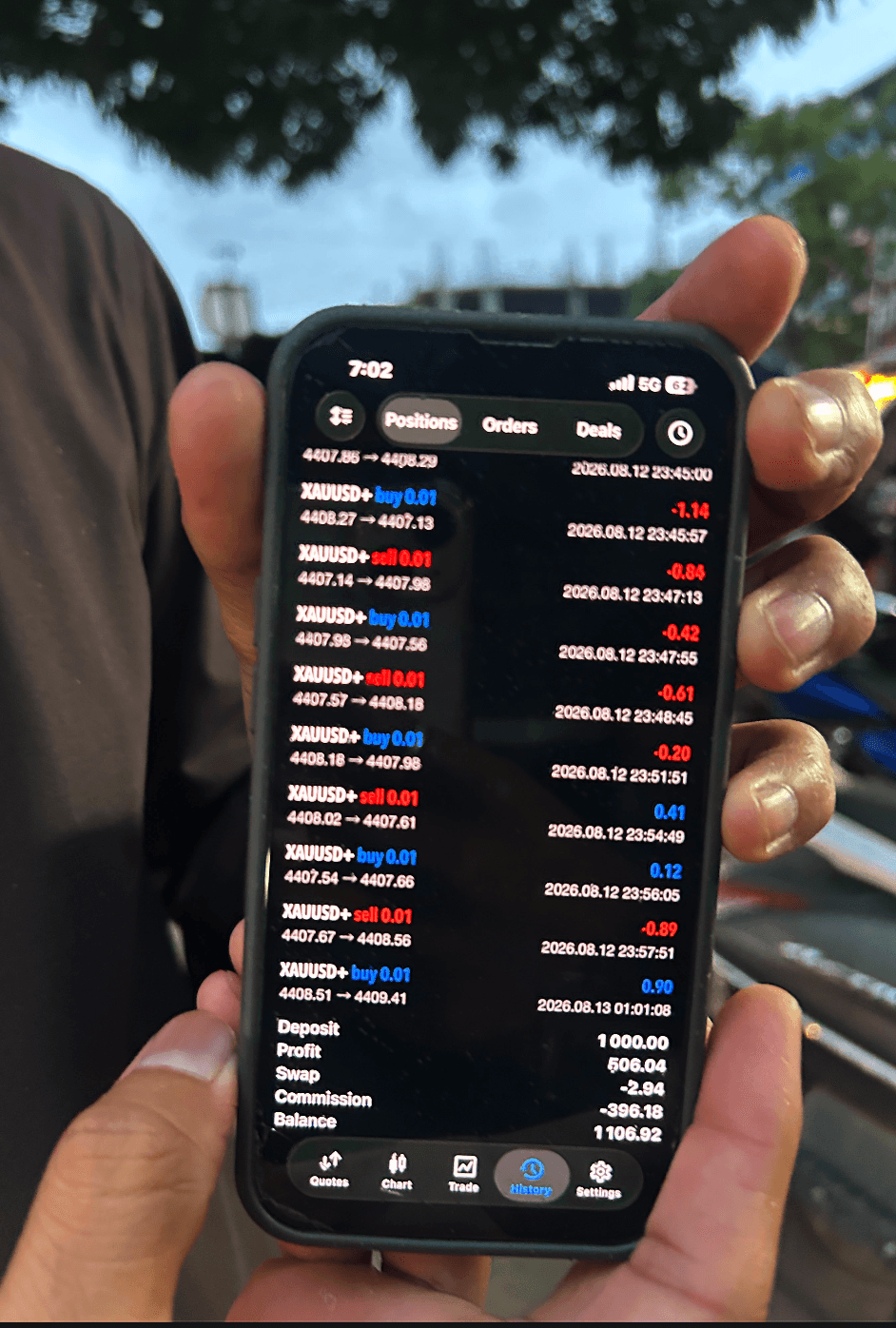 Client phone screenshot showing MT5 XAUUSD profit summary